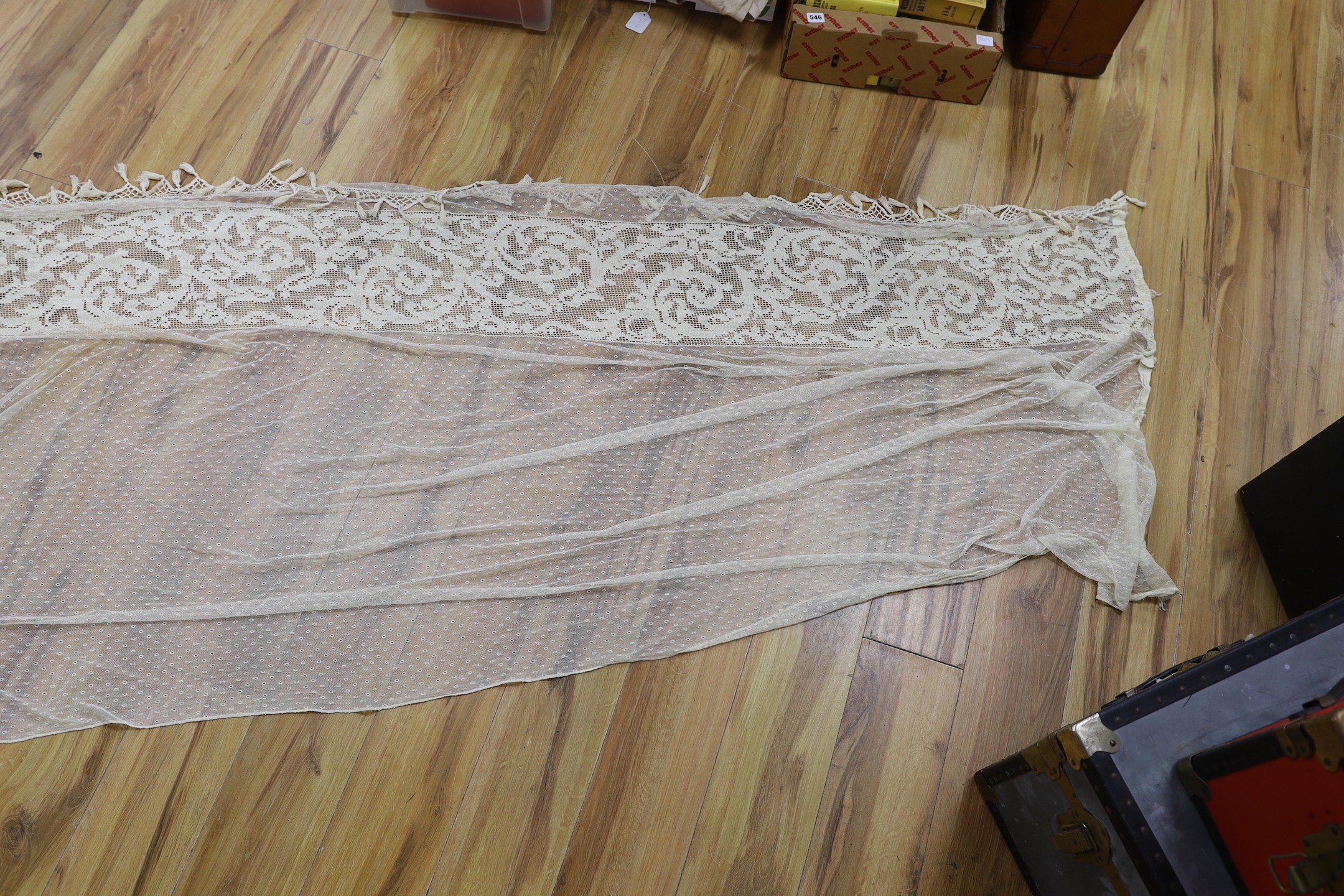 A pair of Edwardian fine net curtains bordered with wide fillet lace, edged with tasselled bobbin lace 272 x 155cm